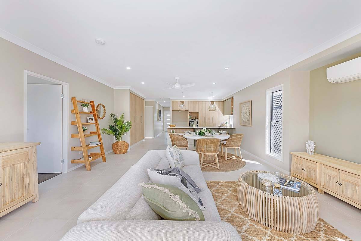Light clean looking living room with a light wooden feel.