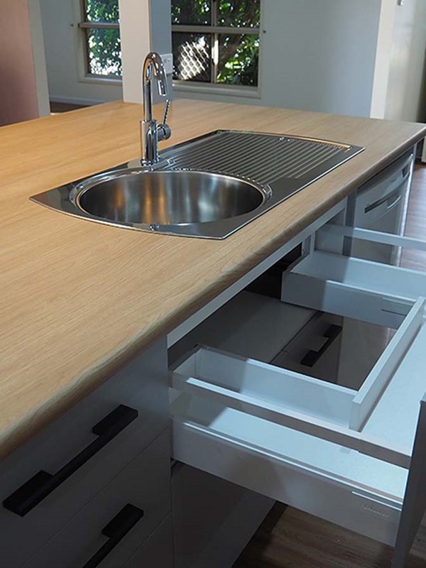 Clever draw design on a kitchen Island bench