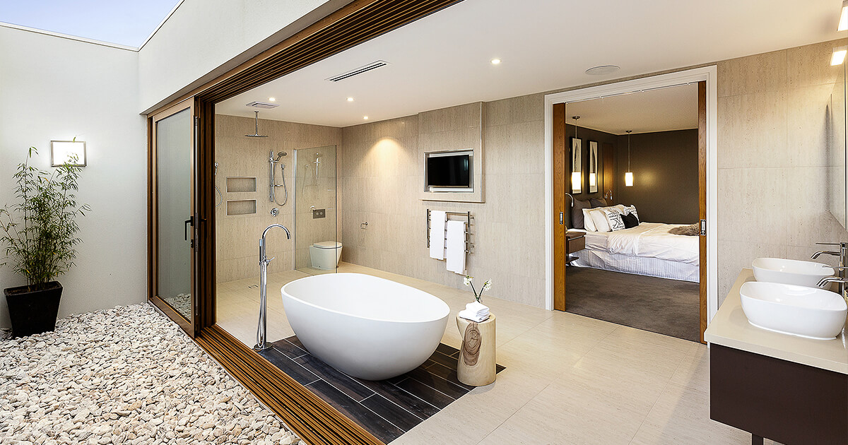 Big bathroom leading onto outdoor courtyard