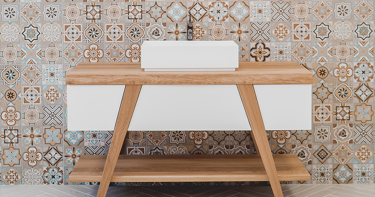 Small patterned tiles on wall in bathroom creating a unique look