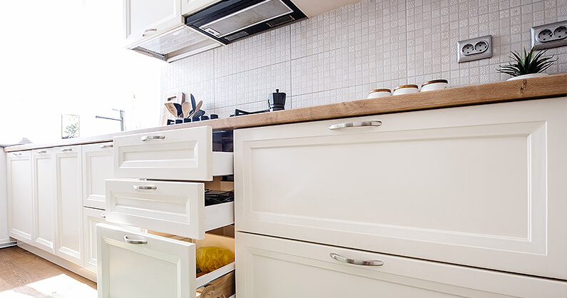 Kichen with warm white cabinets