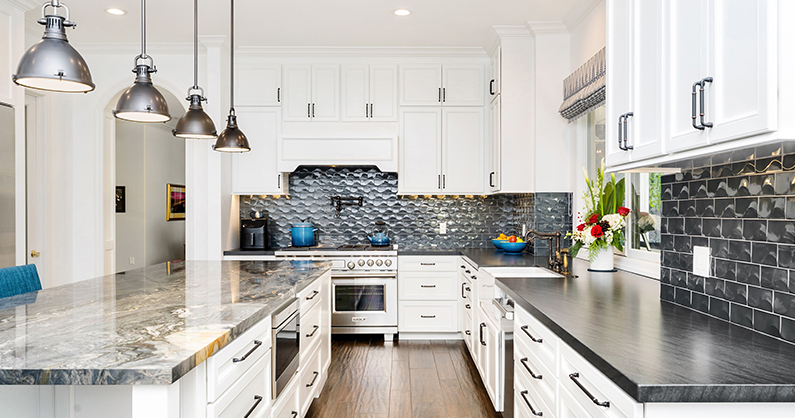 Long kitchen with white, grey and blue