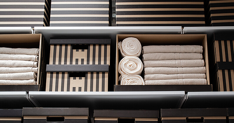 Closet organized in boxes