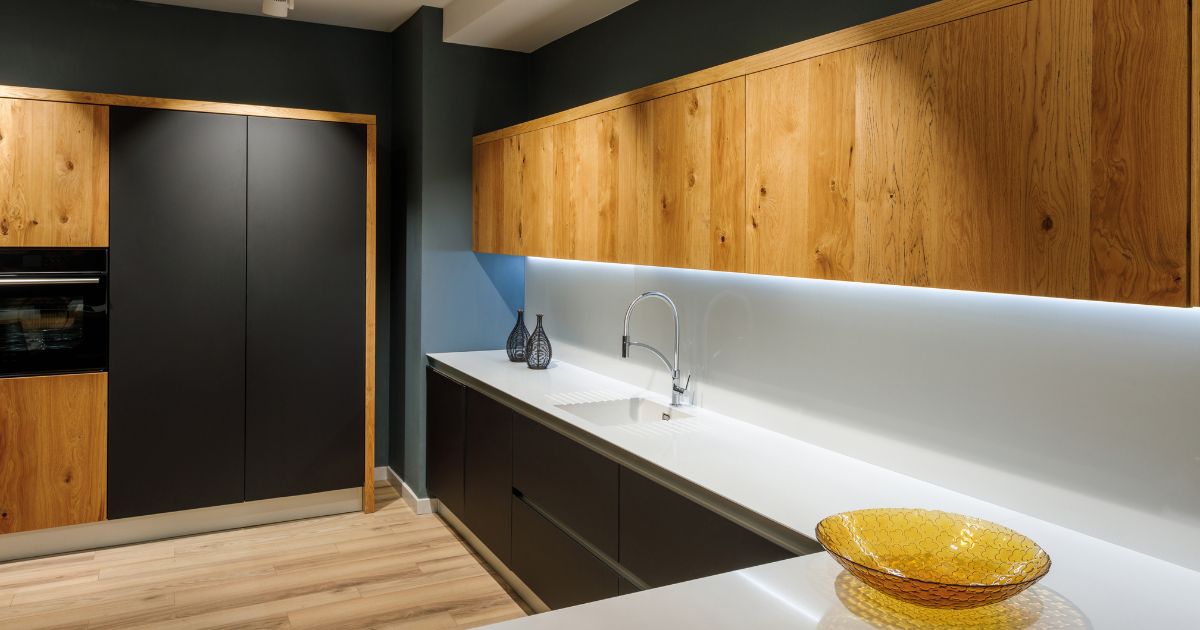 Dark kitchen with handleless cupboards